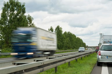 Motion-blur-on-a-truck-at-motorway-000017498318_Medium.jpg